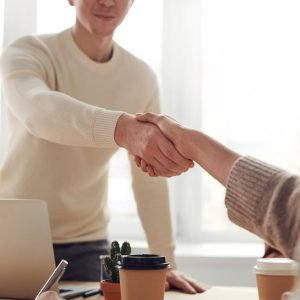 5 Website Brokers for Buying and Selling Websites Photo by fauxels: https://www.pexels.com/photo/man-and-woman-near-table-3184465/